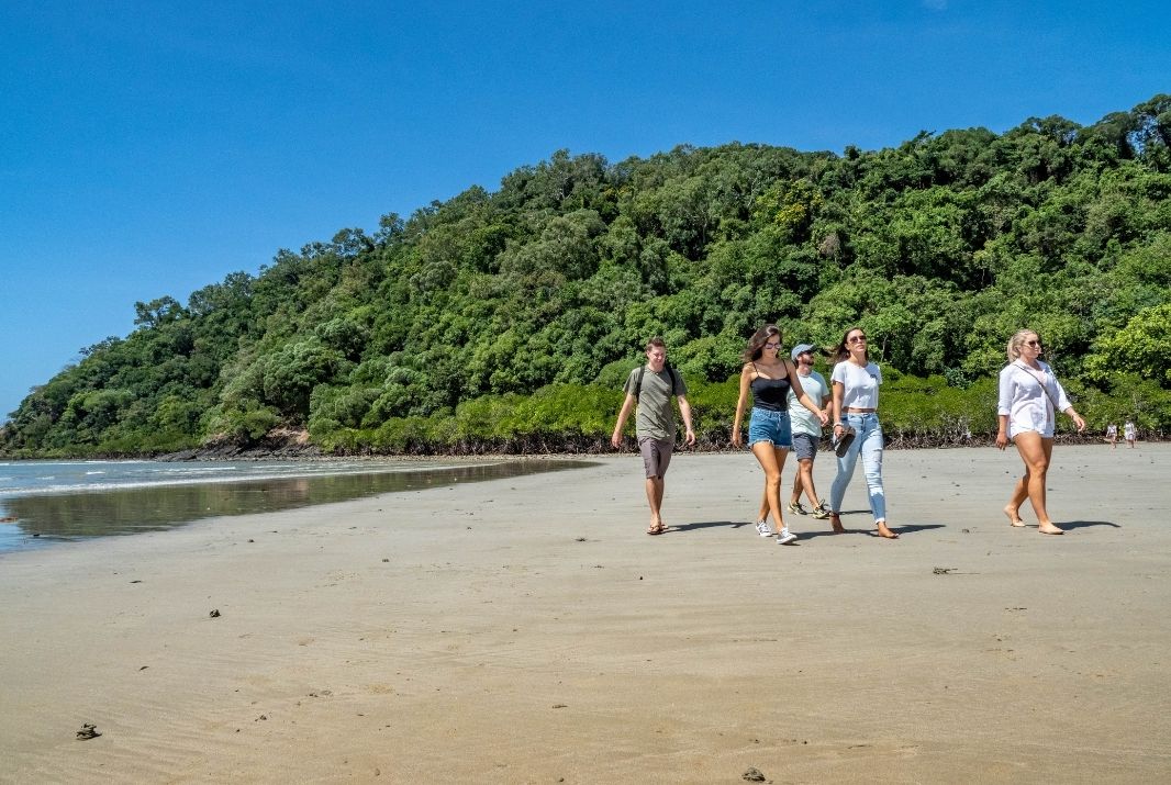 People walking on Cape Tribulation Beach